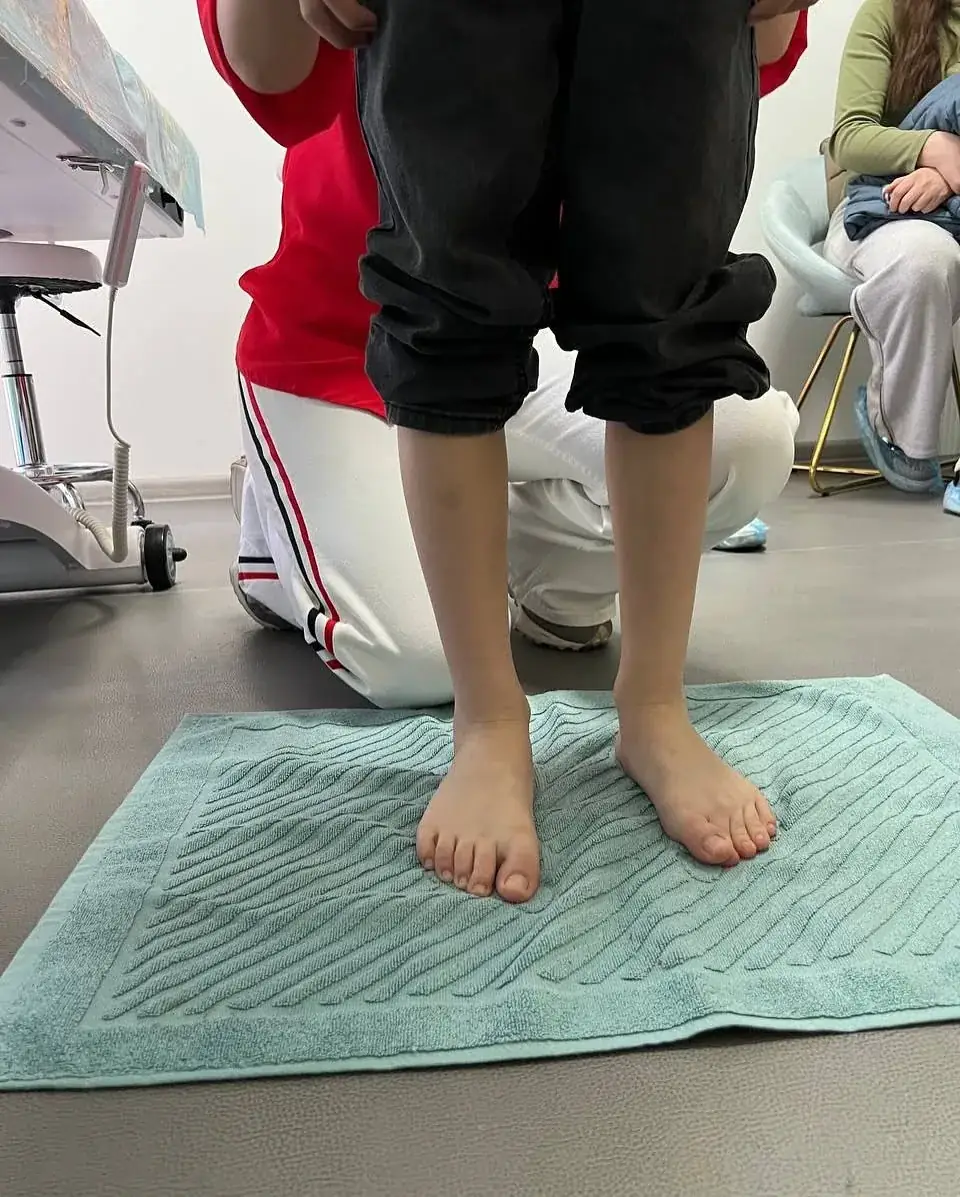 Standing foot examination of a child at ELF Center